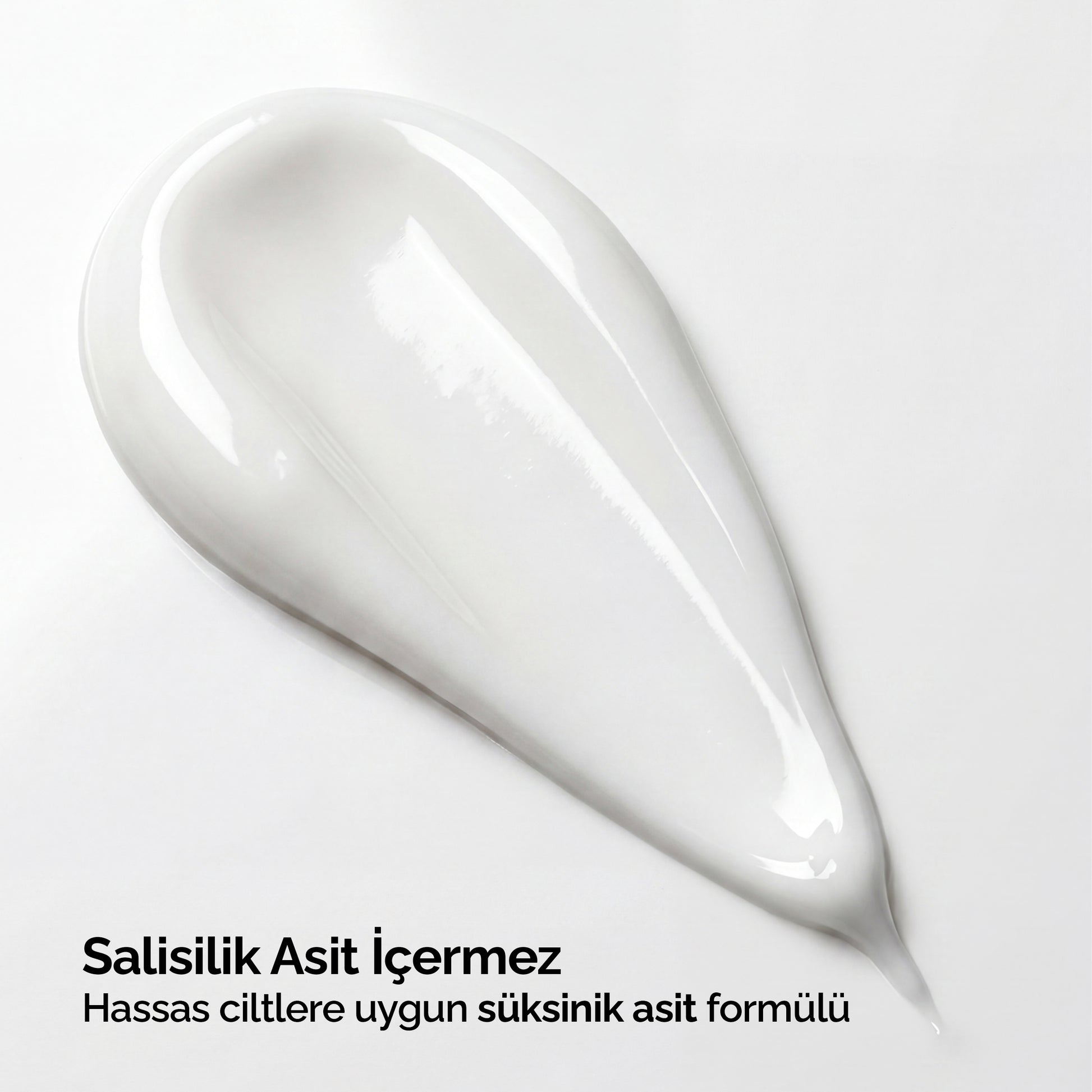 Mineaderm SeboCalm Hydra Cream'in beyaz krem dokusu yakın çekimi; salisilik asit içermeyen, hassas ciltlere uygun süksinik asit formülü.