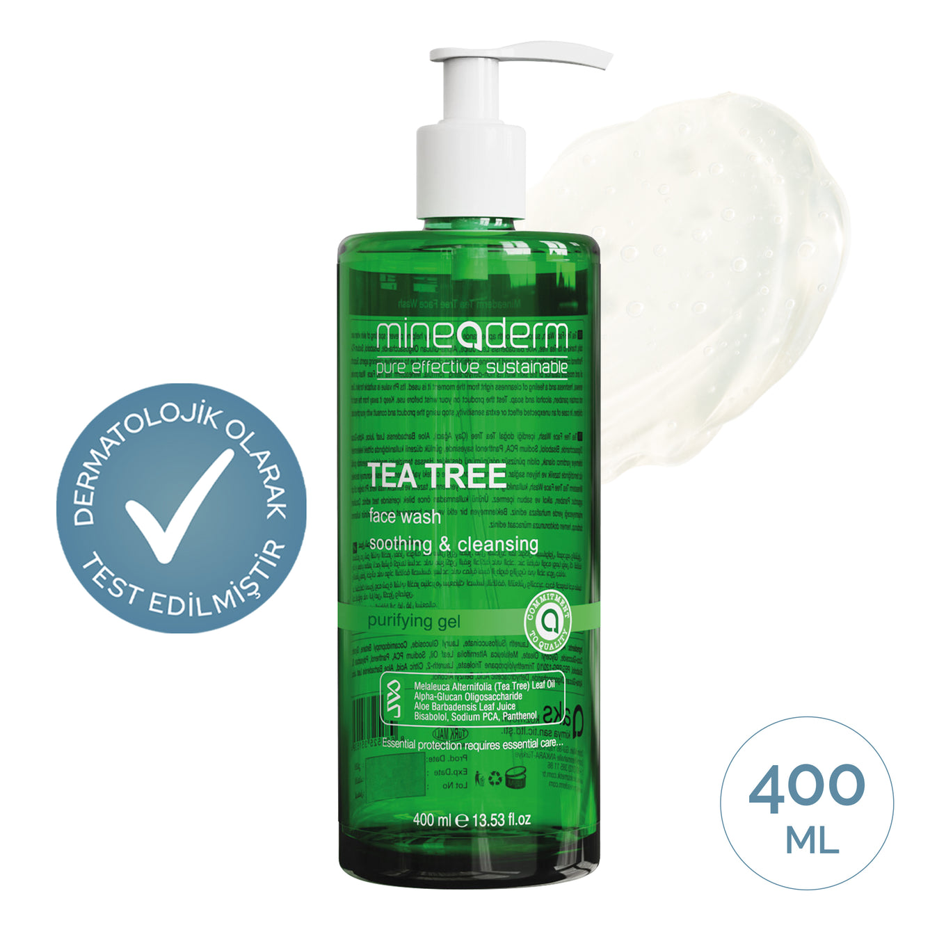 Mineaderm Tea Tree Face Wash 400 ml yeşil pompalı şişe; yanında jel dokusu ve dermatolojik olarak test edilmiştir rozeti. Akneye eğilimli ciltler için sebum düzenleyici yüz temizleme jeli.